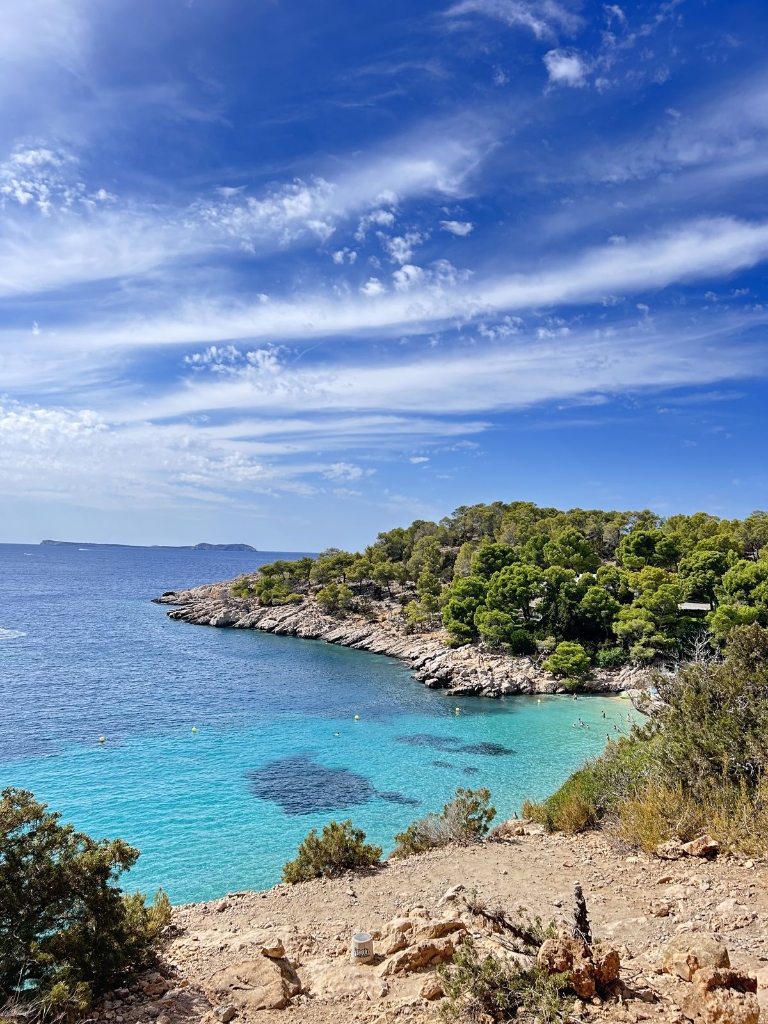 Trippy Travels - Spain - Es Cubells Cliffs Travel Experience Es Cubells Cliffs in Spain for Trippy Travels destination guide and curated itinerary